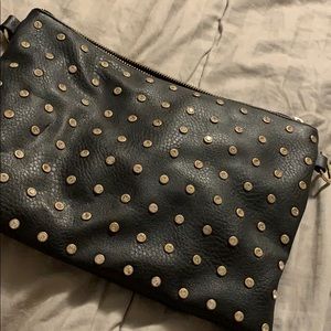 Black clutch or crossbody with straps looks new